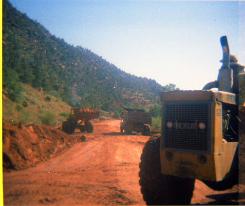 Color photos of flood damage from the flood of 1975.