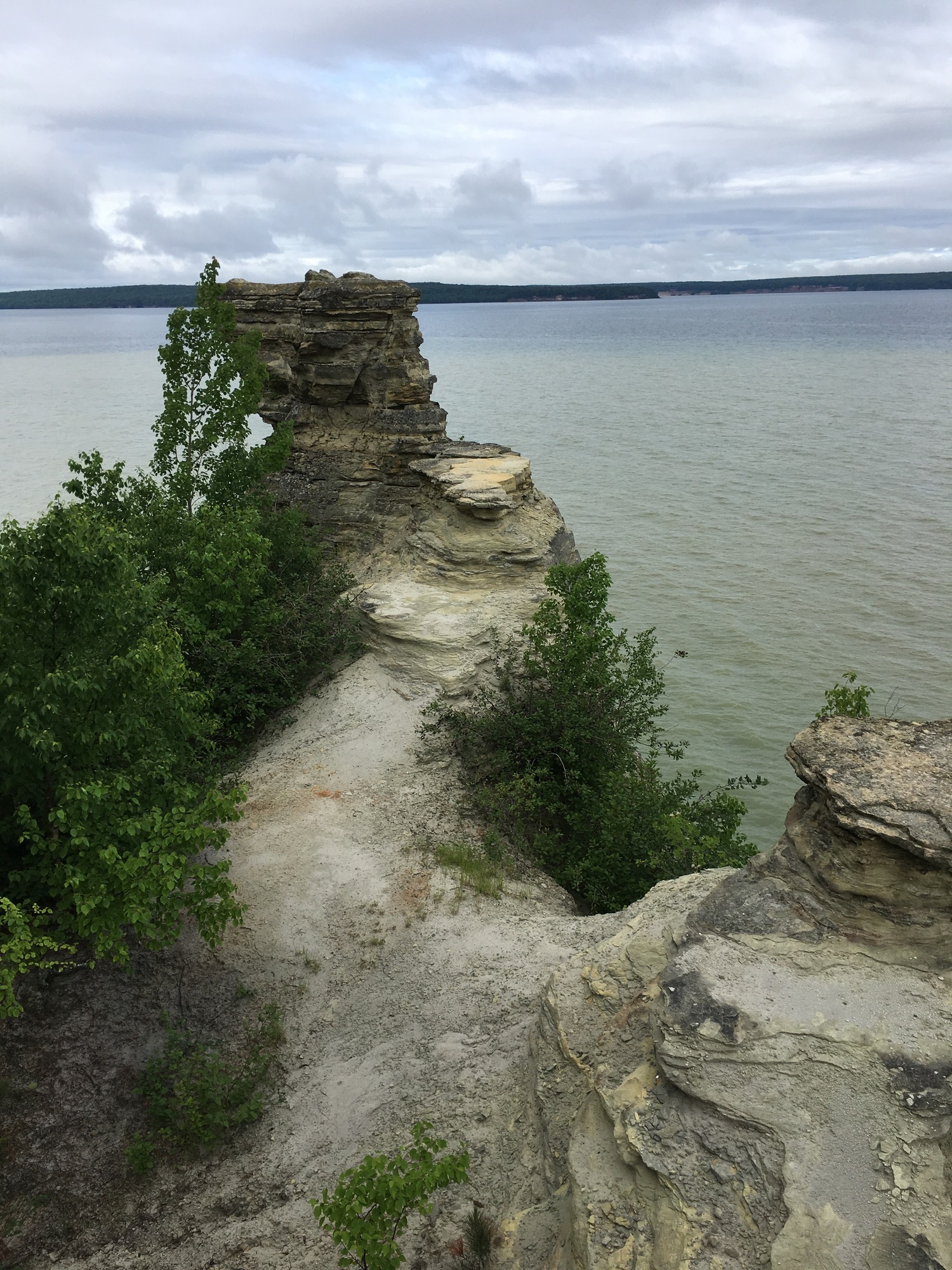The turret looking portion at the top of Miners Castle. Miners Castle is a sandstone layered, heavily eroded narrow rock formation sticking out into Lake Superior.