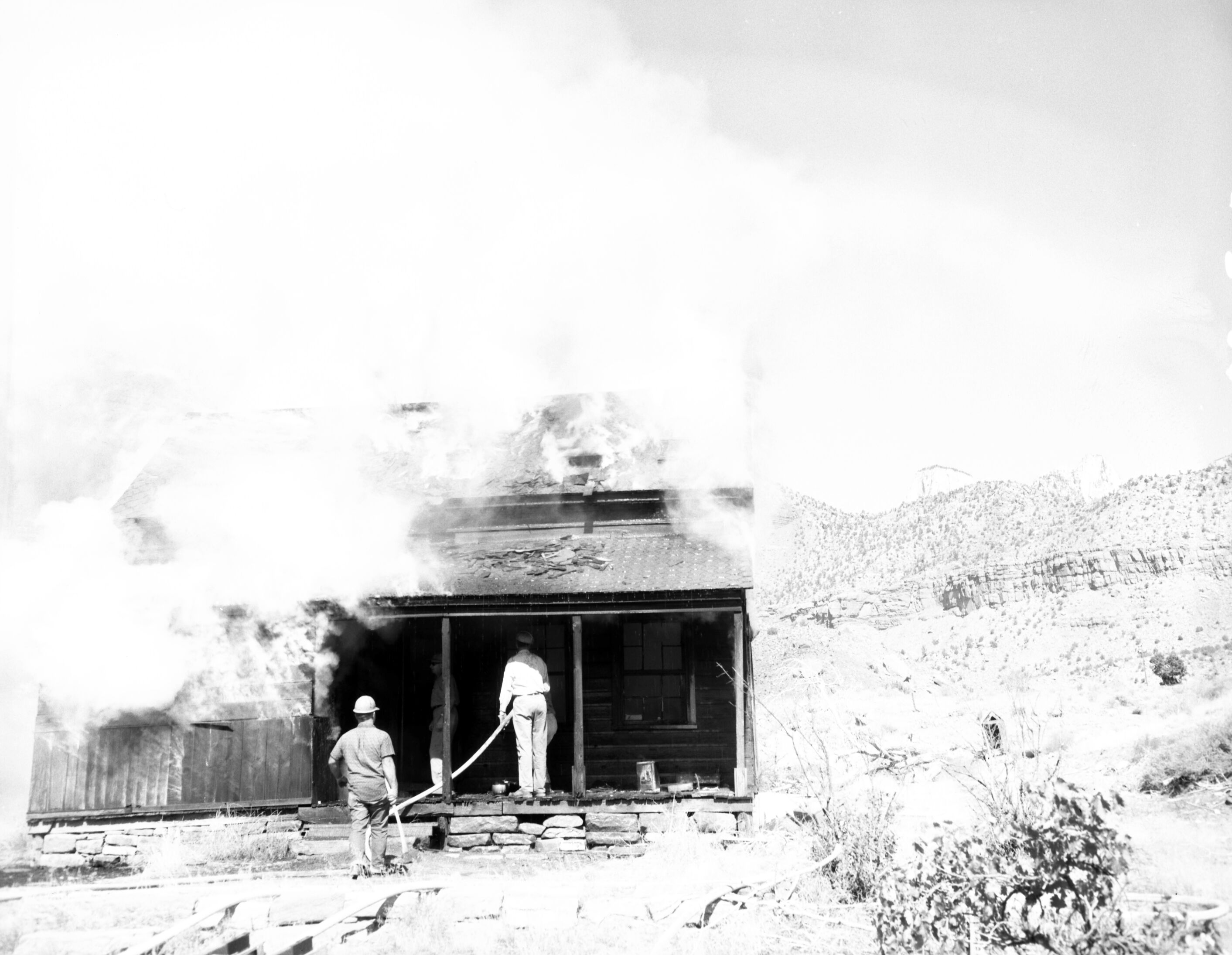 Fire prevention training; demonstration for students of Springdale school. Burning of old Justet home adjacent to Springdale school.