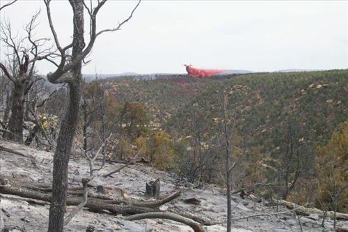 Helicopter involved in fire retardant operations, Long Mesa Fire, Mesa Verde National Park, July-August 2002