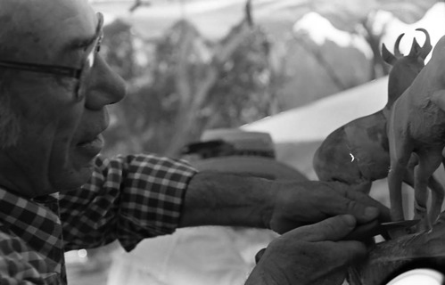 Leo Fesler demonstrates wood carving at the second annual Folklife Festival, Zion National Park Nature Center, September 1978. His son, Richard Fesler, says Leo won an award for this carving of the big horn sheep at Knott's Berry Farm in California.