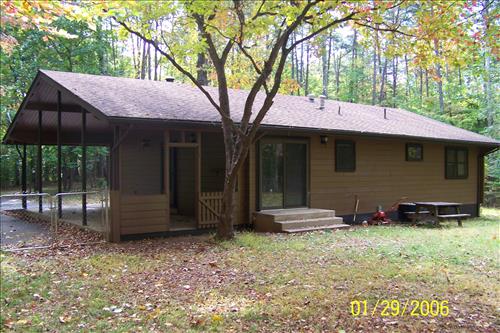 Repair insect/woodpecker damage on Quarters 3 at Prince William Forest Park in September 2009
