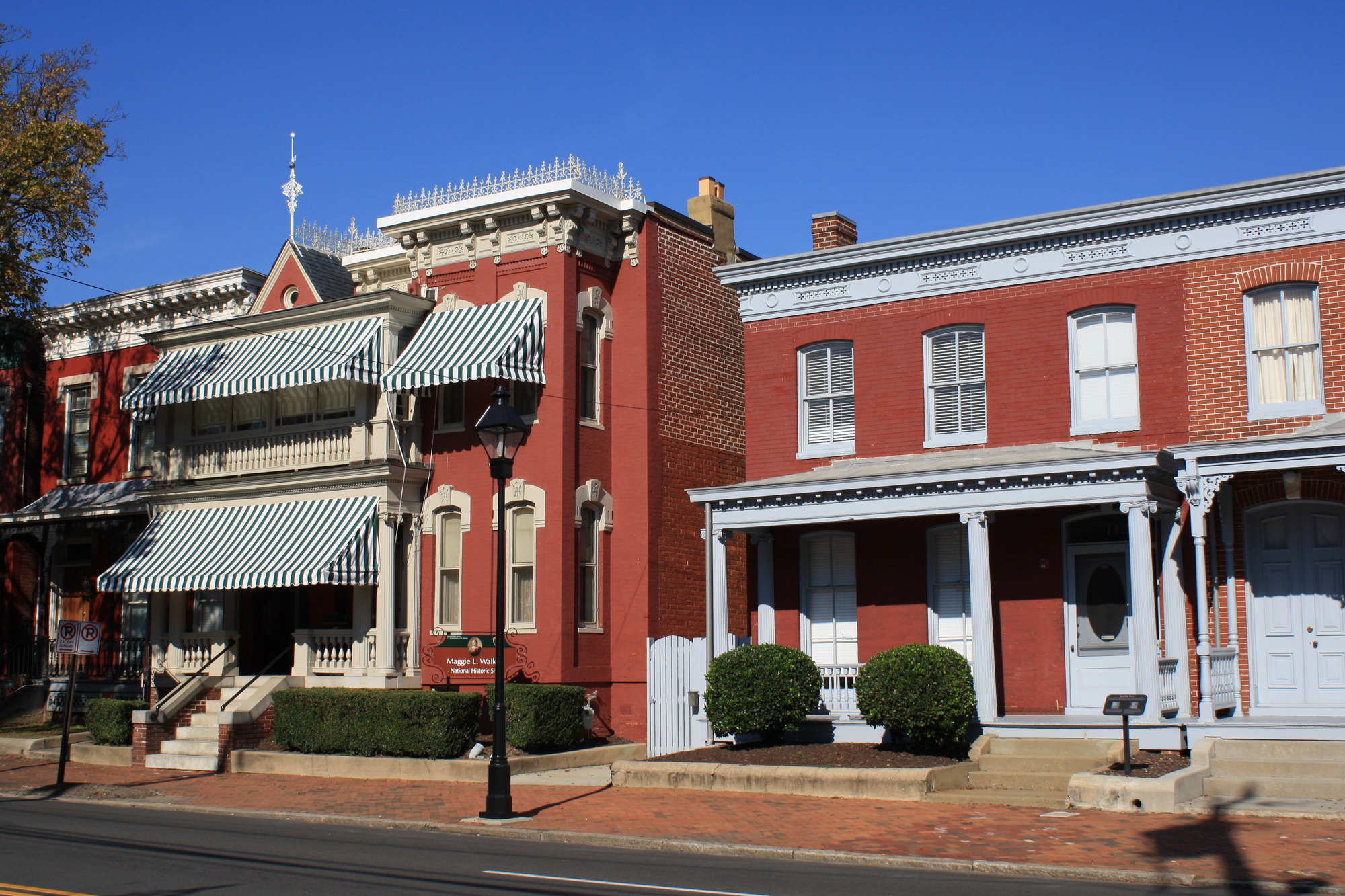 Row of historic red brick townhouses 