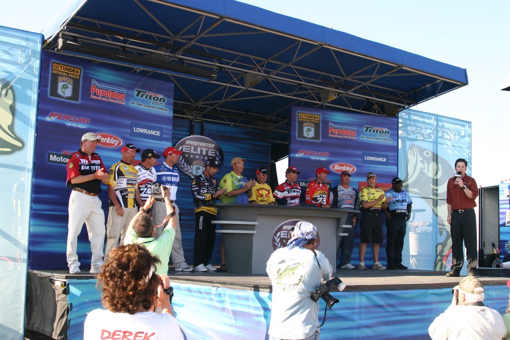 The final twelve anglers gather on stage at the end of Saturday's weigh-in.