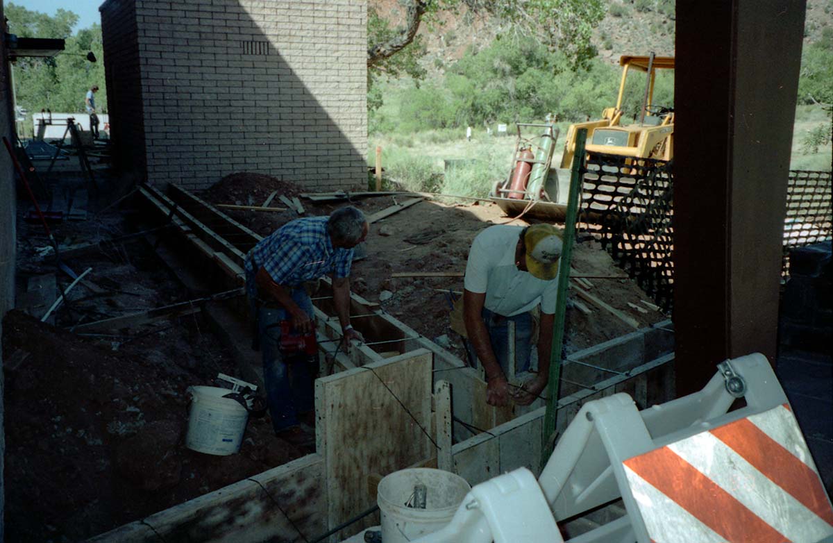 Workers during the construction of headquarters addition.