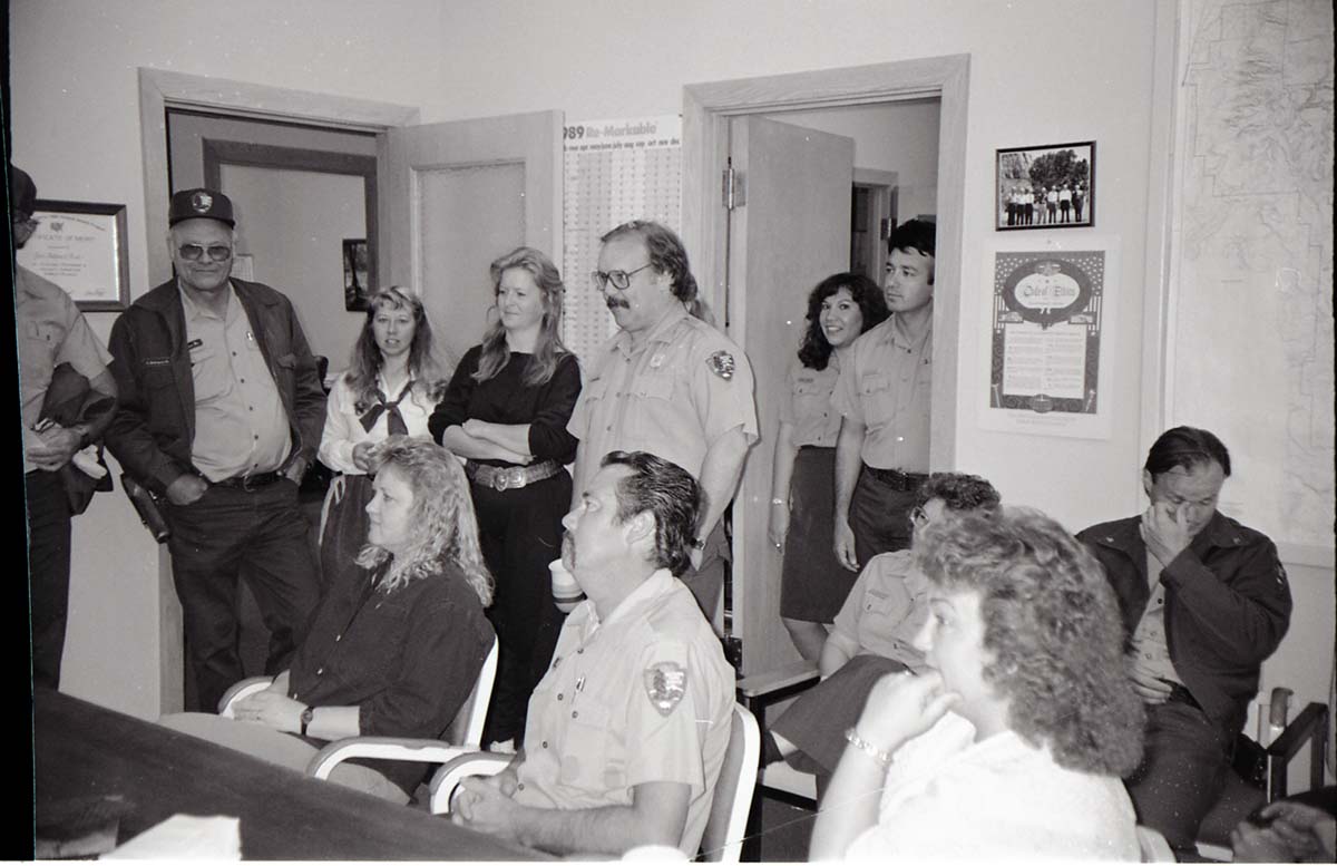 BW Photos of Superintendent Harold Grafe giving out awards to park personnel.