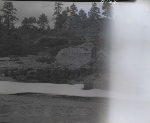 Evan Lee's water system on park land.