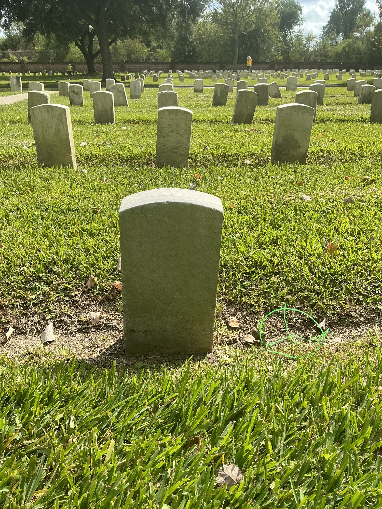 Extra image of historic upright marble headstone with recessed shield face.