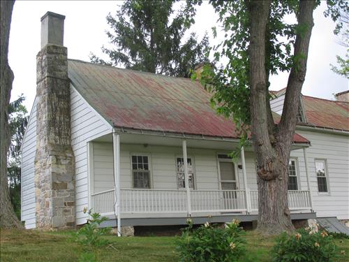 Exterior of the william Roulette Farmhouse in June 2010