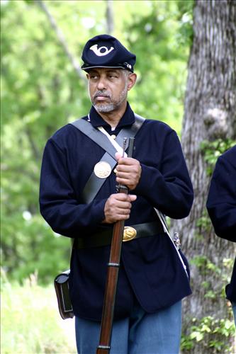Portaits of Civil War interpreters of U.S. Colored Troops with their rifles at Stones River National Battlefield, April 2004