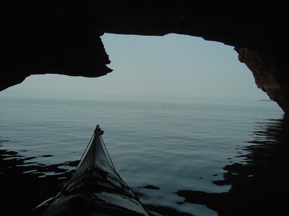 Kayakers regularly explore the mainland sea caves from a launch point at Meyers Beach when conditions are calm. Always take caution and check the lake conditions before you head out.