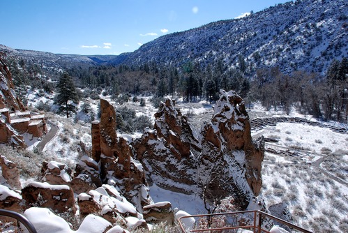 A wintery view of Frijoles Canyon showing Talus House (on the left) and Tyuonyi village (on the right).