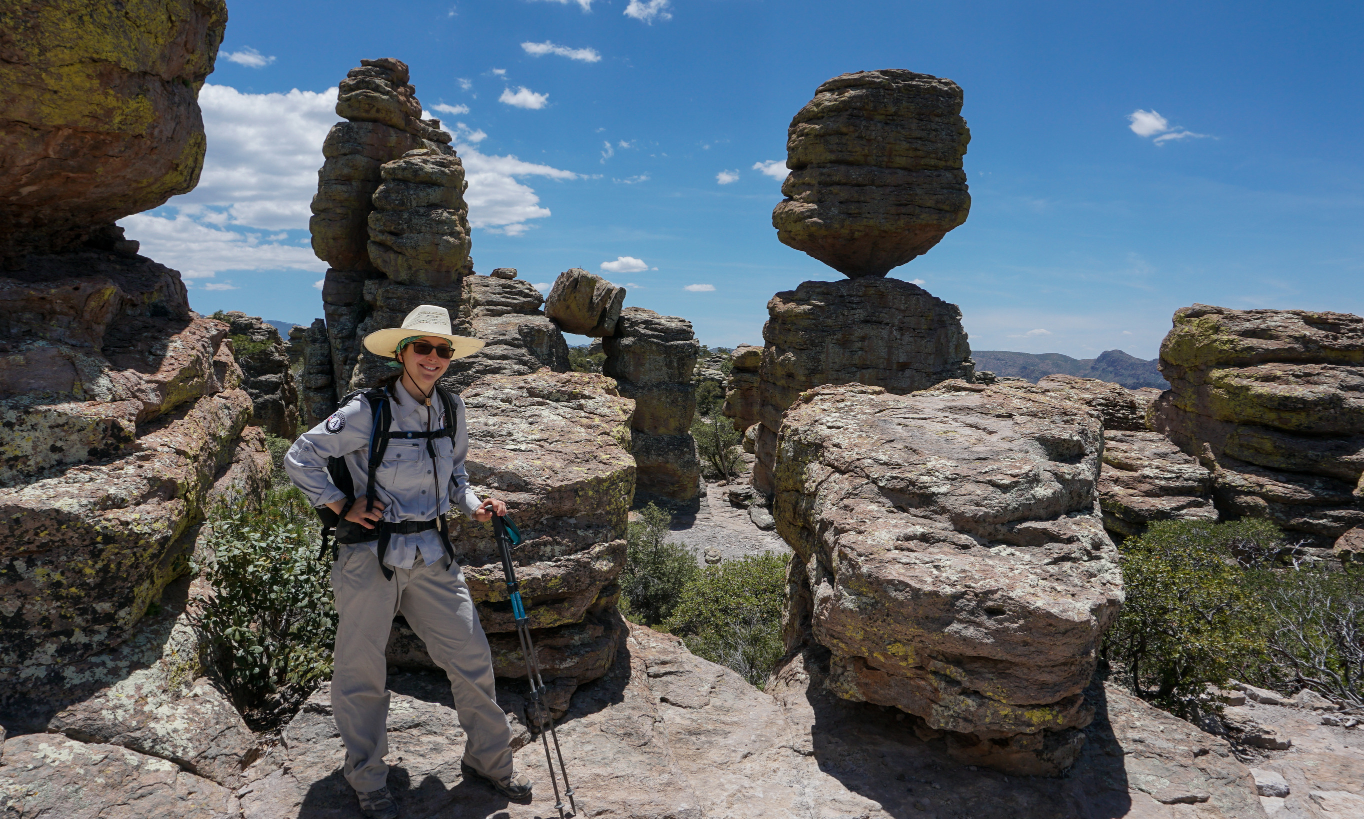 person standing among unusual rock formations