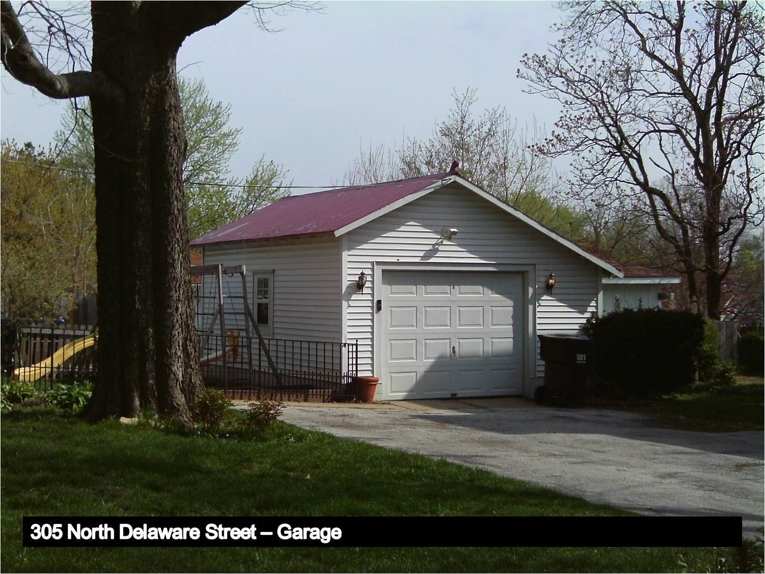 Image of a garage with a gabled roof.