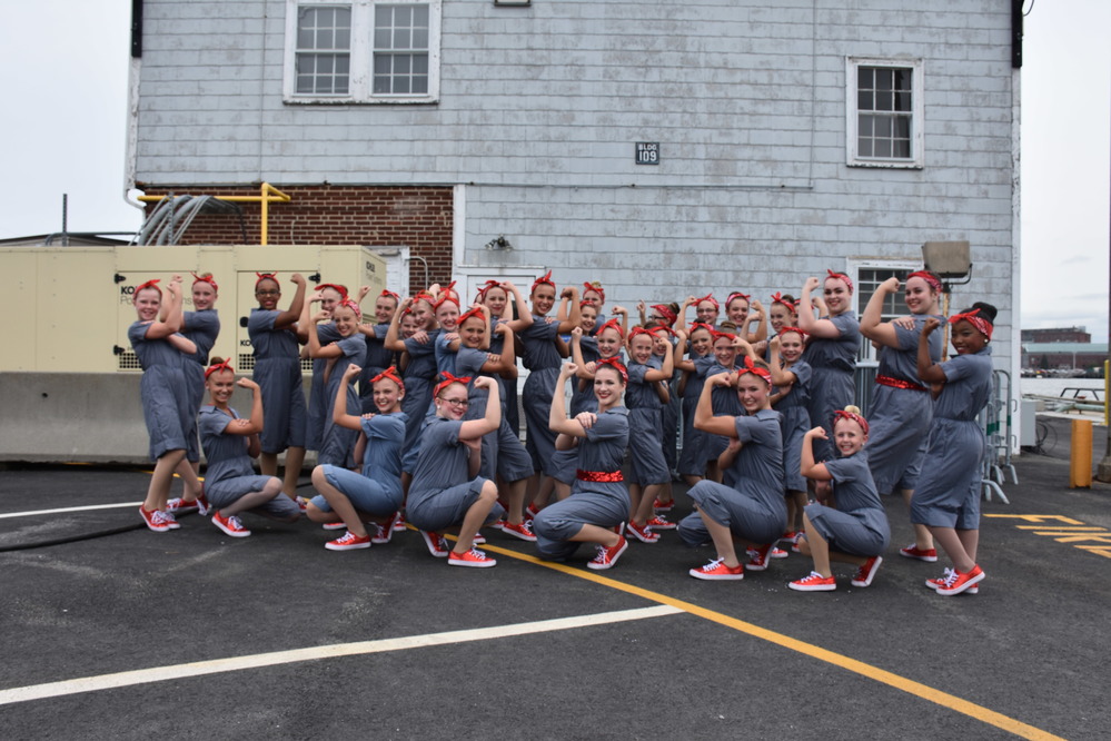  Dancers from Studio 107 pose after they performed during the annual “Rosies Invade the Yard” August 12, 2017.