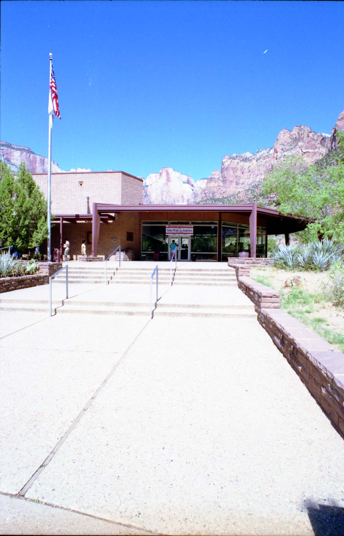 Color Photos of the parks 72nd anniversary celebrations- cake cutting, barbecue, speakers.