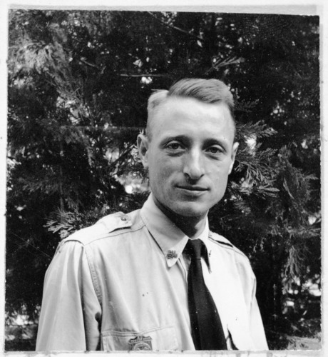 Copy Neg: Michael Dixon, 1985. Original photo in the 1940 Yosemite Field School Yearbook. "Carl Sharsmith - Ranger Naturalist, botanist, and Prof. at U. of Minn. The most envied naturalist. he can find the easiest way up a mountain, and it not afraid to get down on his knees to worship the alpin flora. He is a past master at "trumpeting" and playing the caliope. As an expounder of poetry, bar-room and otherwise, he is unsurpassed. There are so many things that could be said about Carl that we had better just say, 'We'll miss him.' "