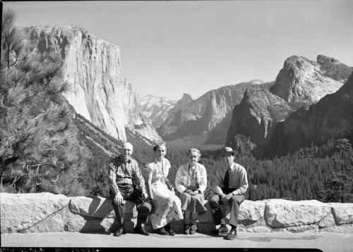 Left to right: Mr. Ralph Assheton, Mrs. Assheton, unidentified woman & Ranger Wayne Brynat, at Inspiration Point. Mr. Assheton is a Member of the British Parliament, a close friend of Winston Churchill, and a member of the Privy Council.