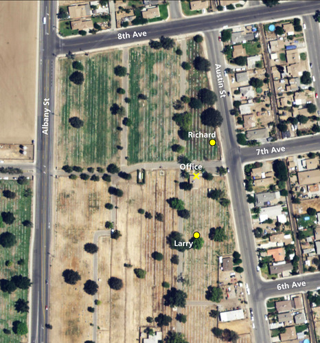Aerial photograph of the cemetery. White vertical lines are rows of grave markers. The northernmost yellow dot indicates the location of Richard Chavez's grave. The southernmost yellow dot indicates the location of Larry Itliong's grave.