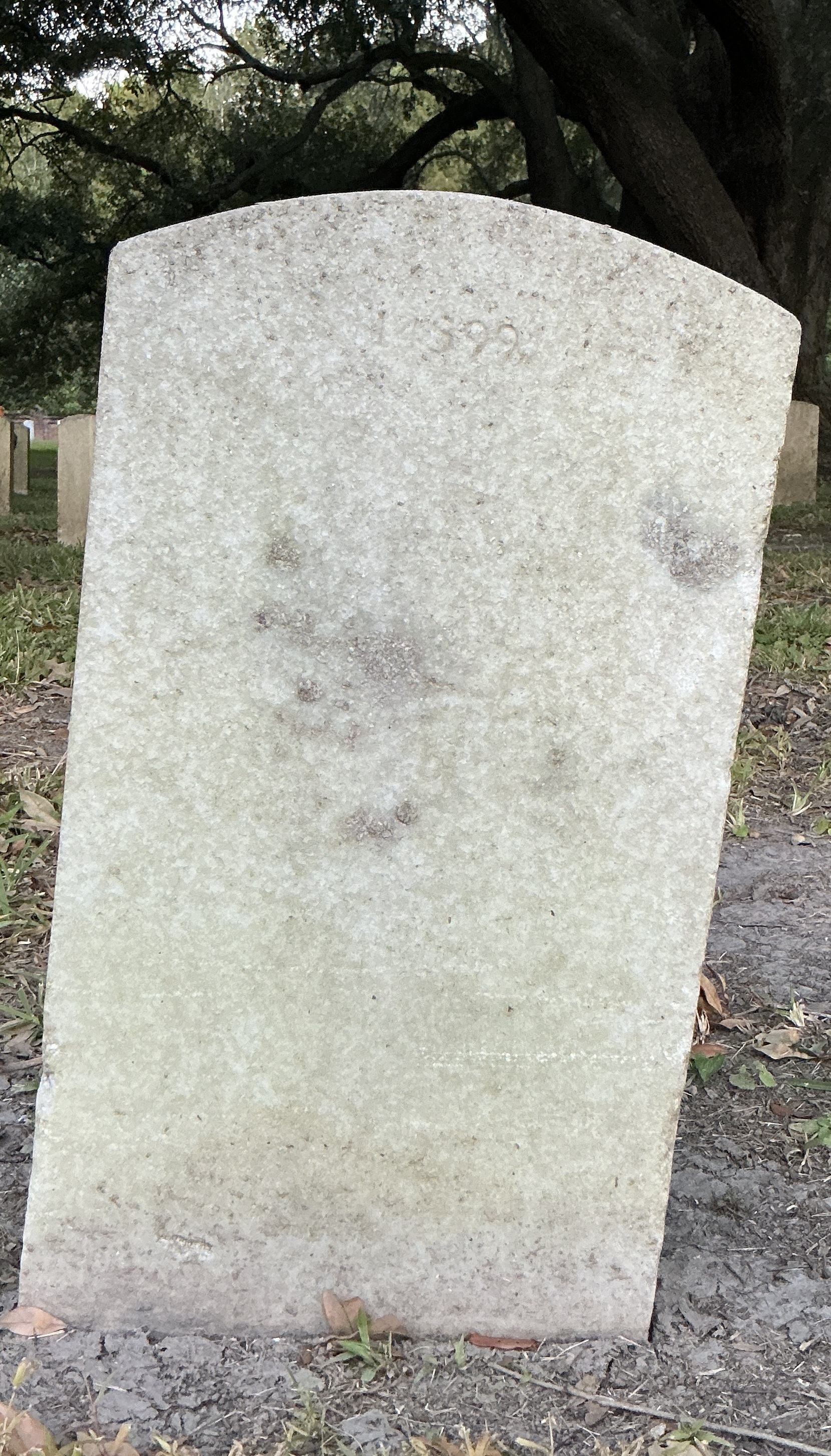 Back of upright marble headstone