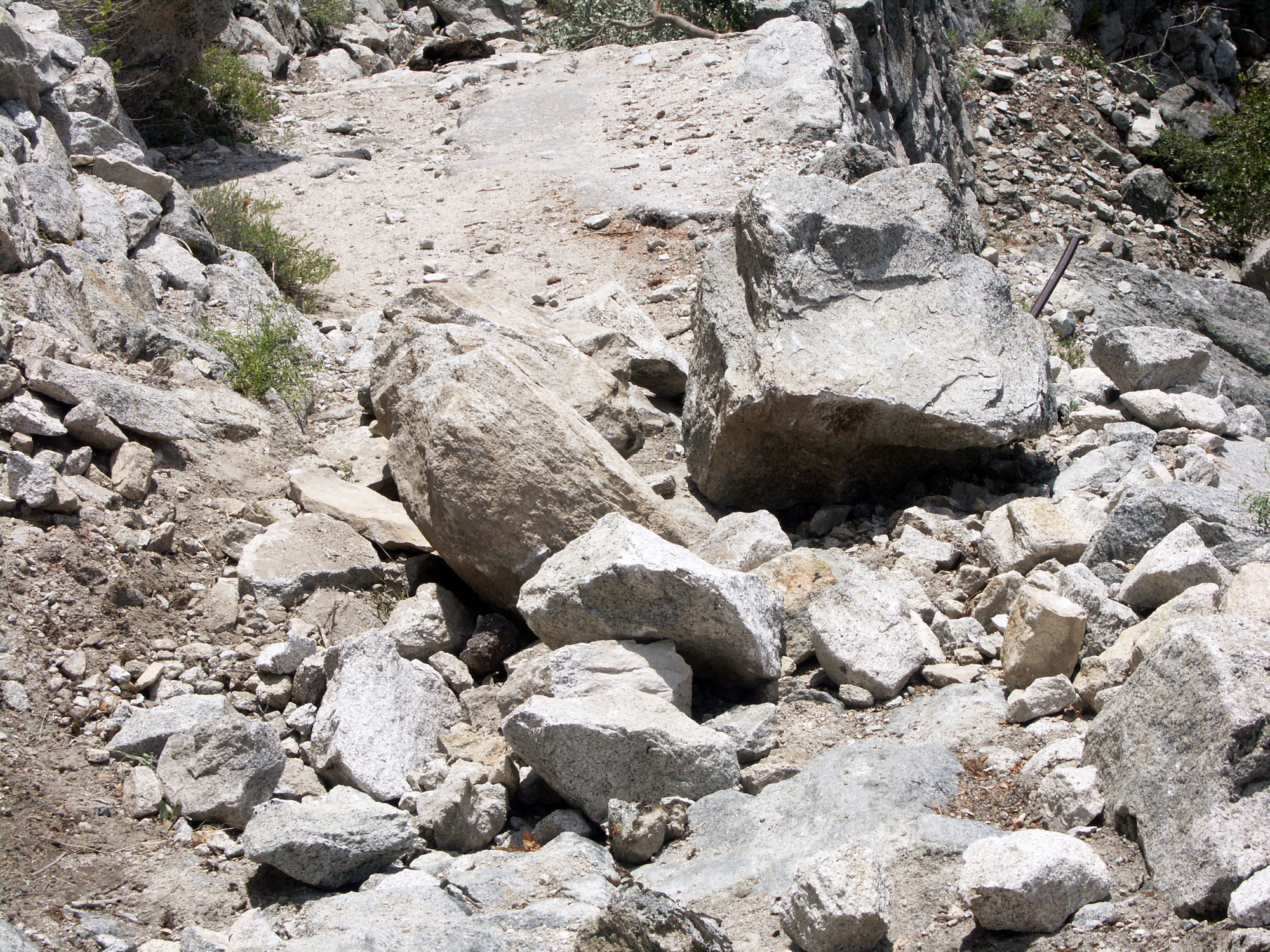 Fresh rock debris on trail.