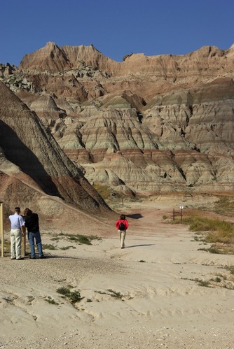 Visitors prepare to hike the Saddle Pass Trail.