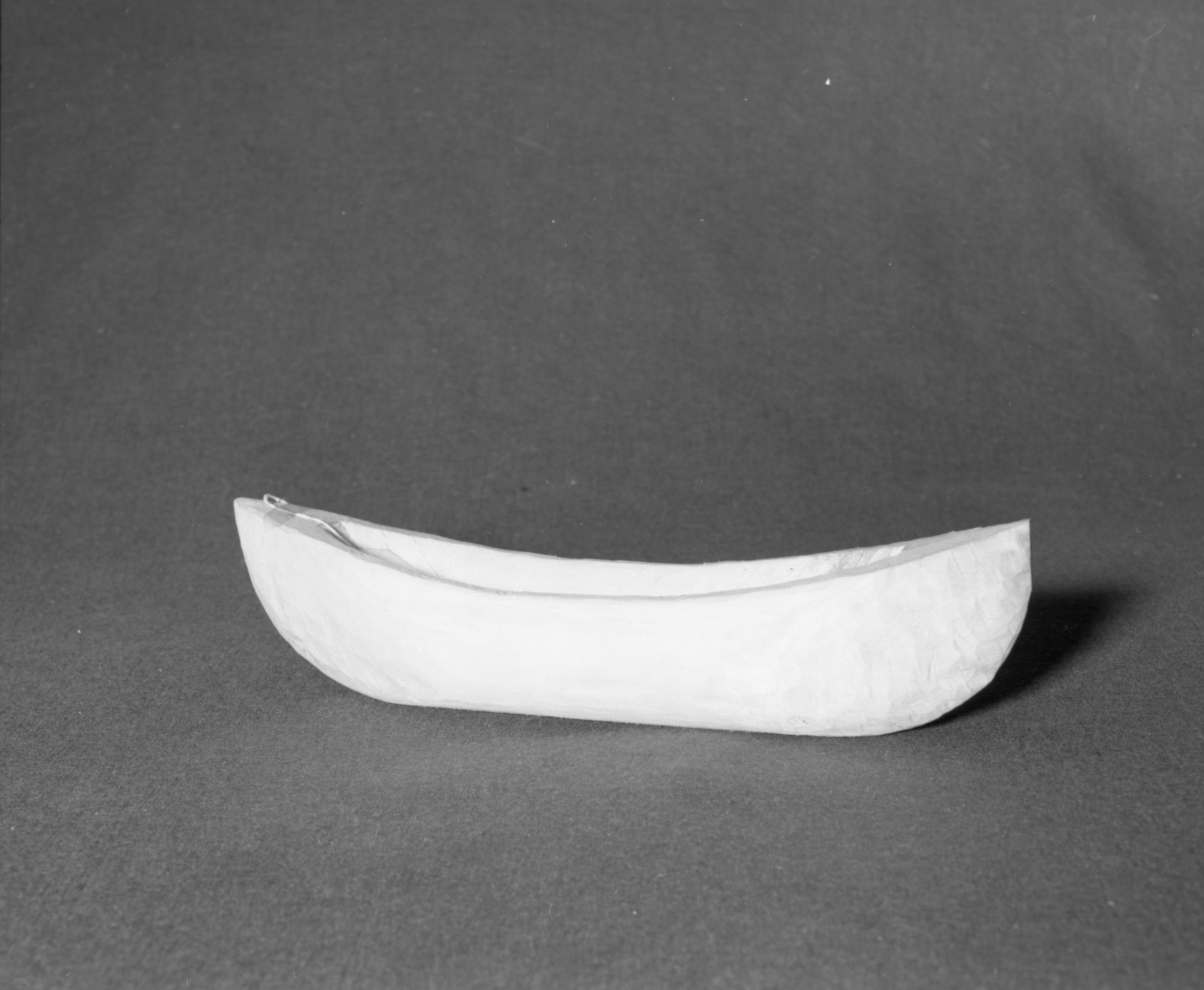 Marie Rozier Collection, Catalog No. 2-CAN-5. Object: Shushwap (Salishan) boat model. Dimensions: 16 x 3 1/2". Materials: Black cottonwood. Collection History: Made by young boy at Salmon Arm, B.C., 1969. Photographed by Michael Dixon, December 1982. Catalogued by Craig Bates and Barbara Beroza. Yosemite Collections, National Park Service.