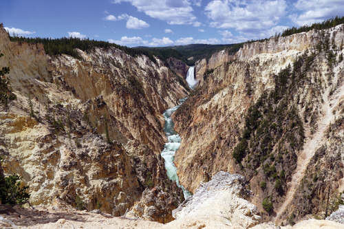 View up the canyon at Lower Falls, with the sides of the canyon visible.