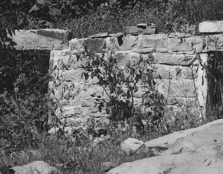 black and white photos of building ruins