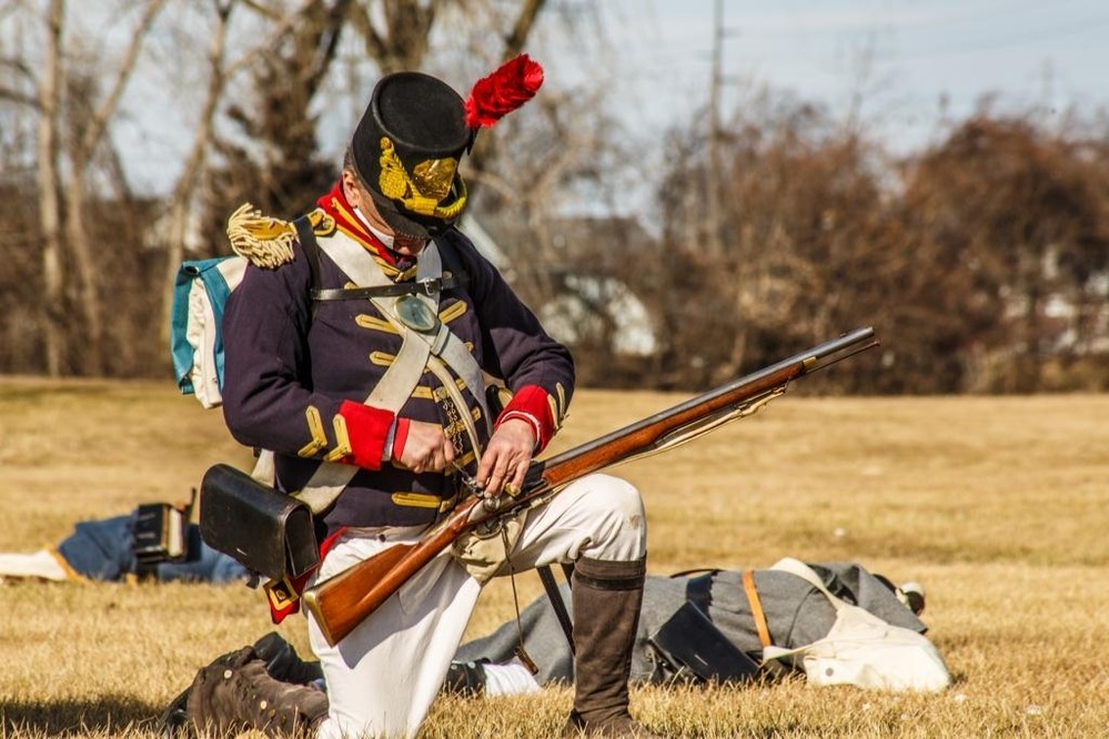 Soldier loading his musket