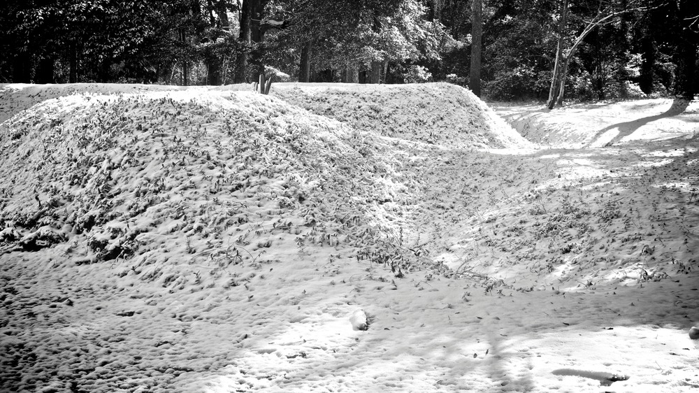 Black and white view of the earthwork covered in snow