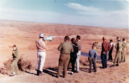 Boy Scout troup with guide touring the Canadian River Dam site.