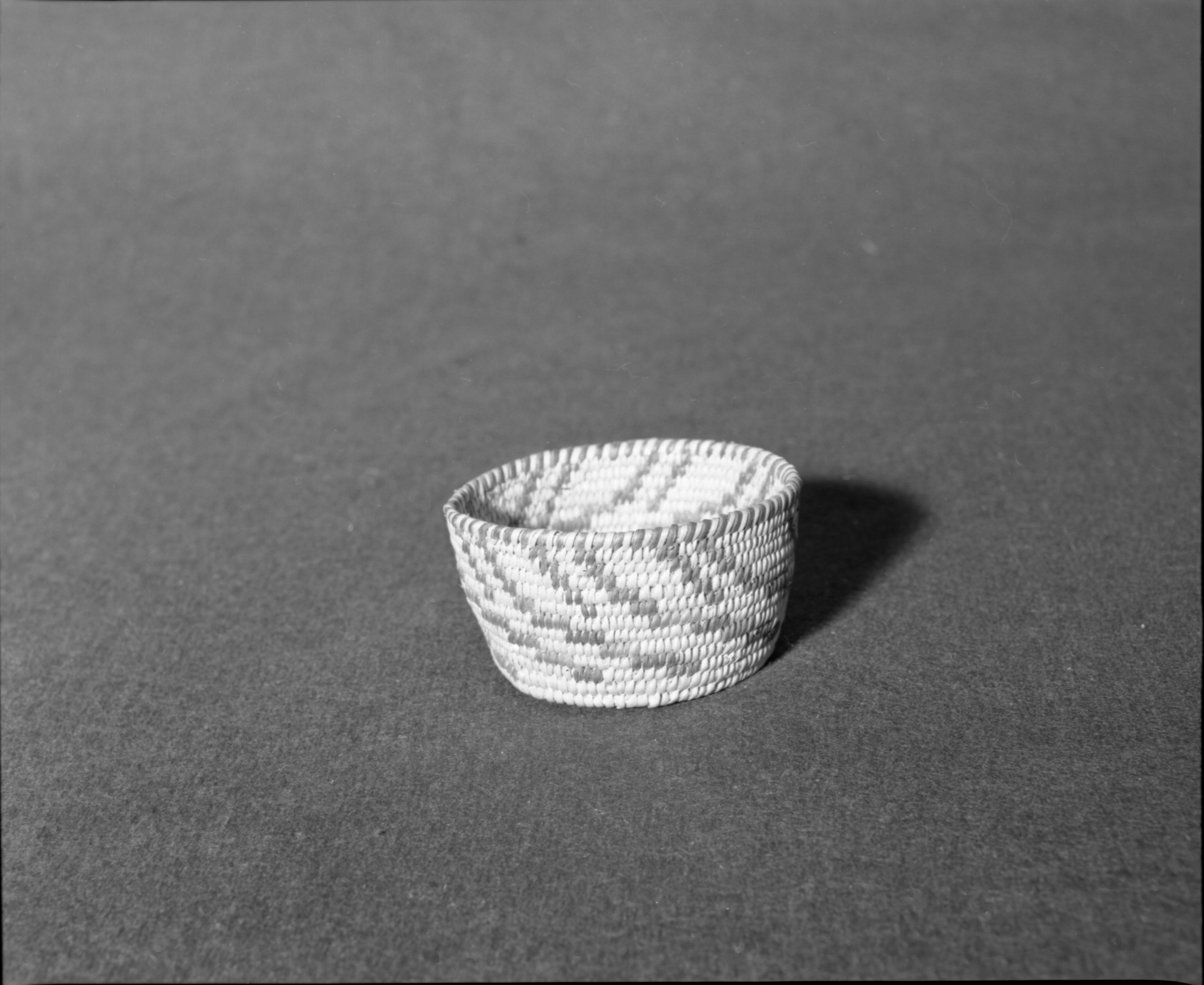 Marie Rozier Collection, Catalog No. 123. Object: Pima basket. Dimensions: 4 x 2". Materials: willow, devil's claw, cattail stem. Technology: ---. Collection History: Acquired from Mary Long. Photographed by Michael Dixon, Dec. 1982. Catalogued by Craig Bates and Barbara Beroza. Yosemite Collections, National Park Service.