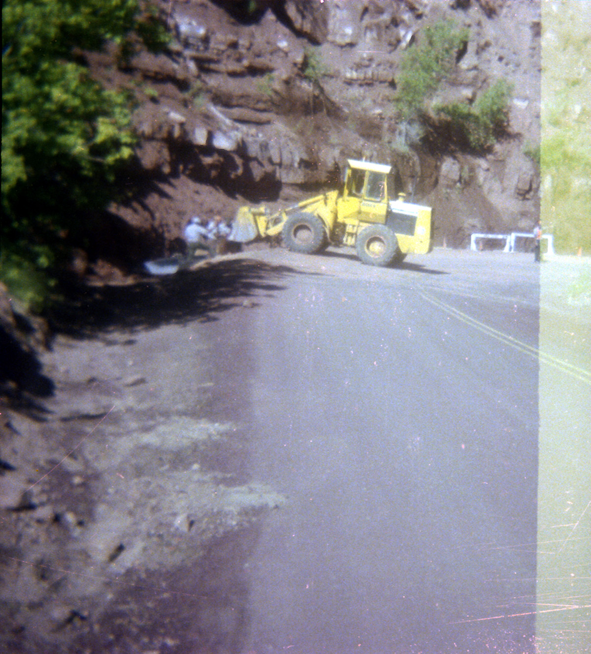 Tractor performing graveling/draining operations along the Zion-Mt. Carmel Highway switchbacks.