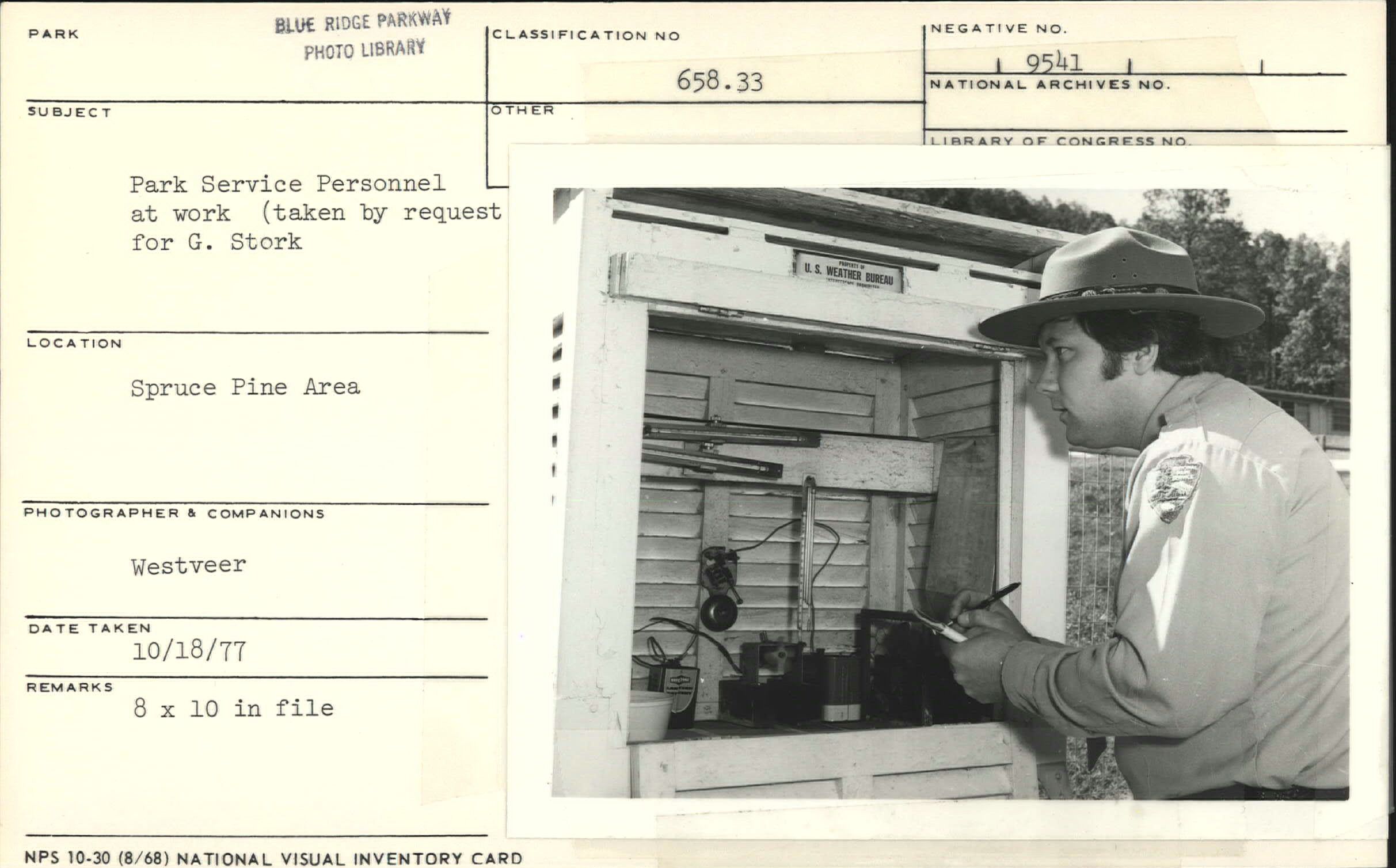 Park ranger recording weather information