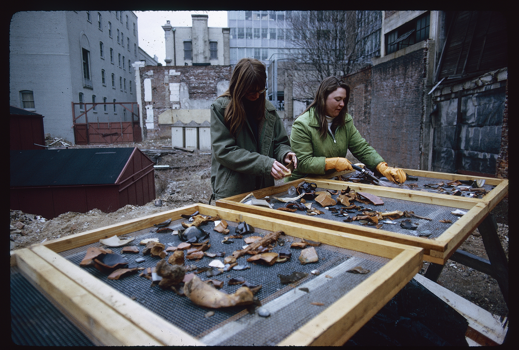 Franklin Court. Looking southwest. Archaeology. Cleaning artifacts on site.