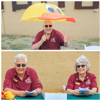 Two panel collage. Top panel shows woman in red volunteer polo under an umbrella shaped and colored like a duck's head. Bottom panel shows two women in volunteer polos distributing fliers detailing the day's agenda.