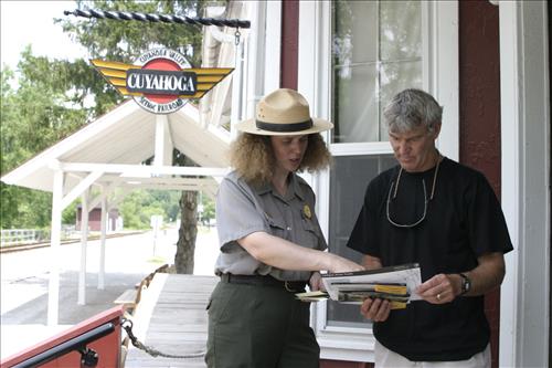 Ranger With Visitors Outside Peninsula Depot