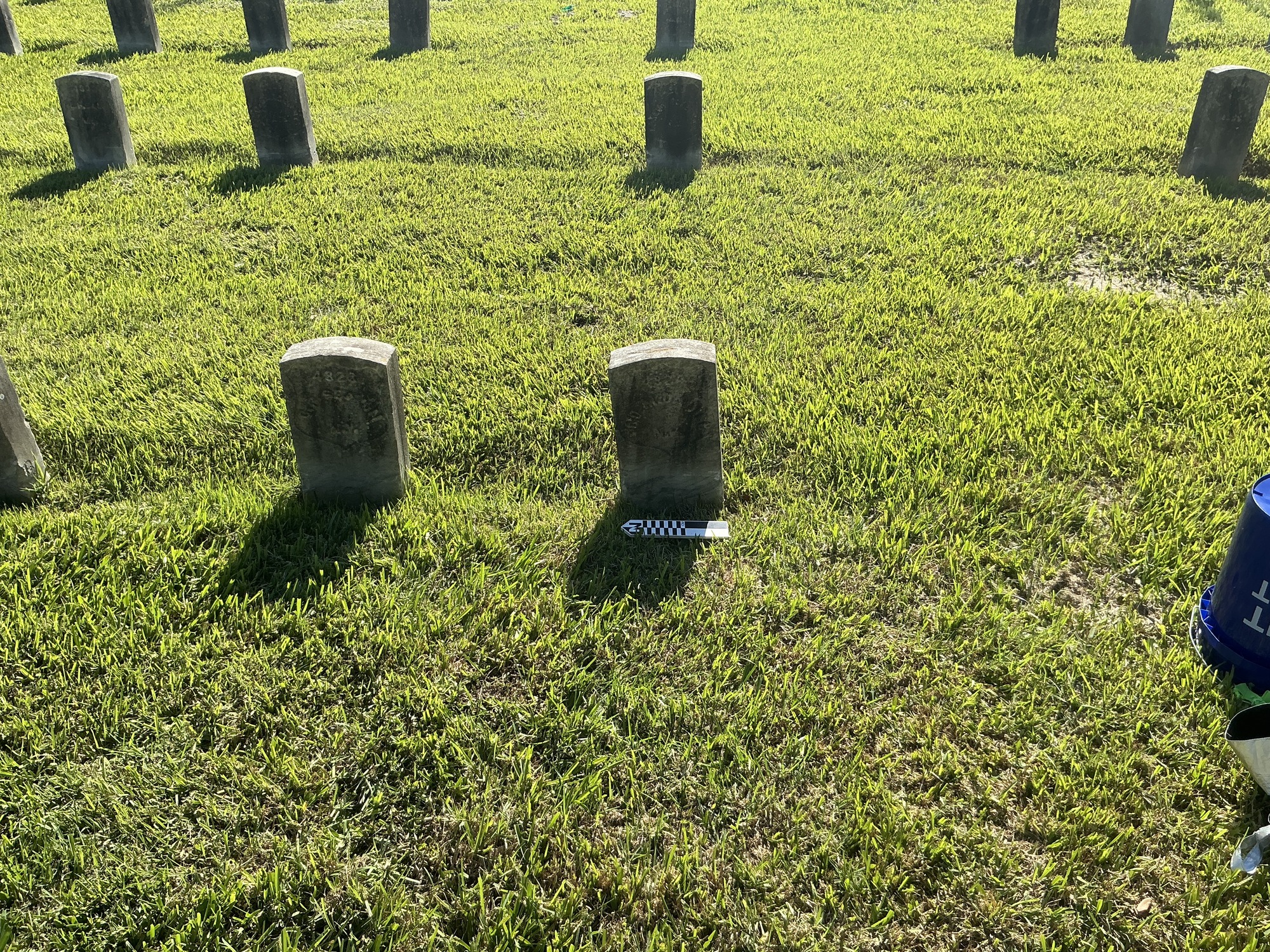 Extra image of historic upright marble headstone with recessed shield face.