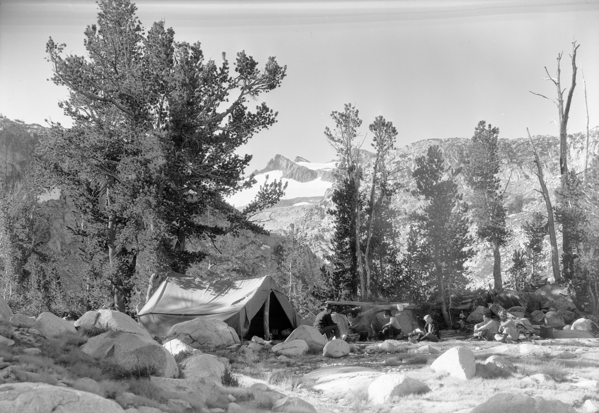 Lyell Base Camp (with newsreel man & others). Left to rt. Dave Brower, Ham Macaughley, C.A. Harwell, Joe Rucker (Paramount), Jack Kuhne (Movietones).