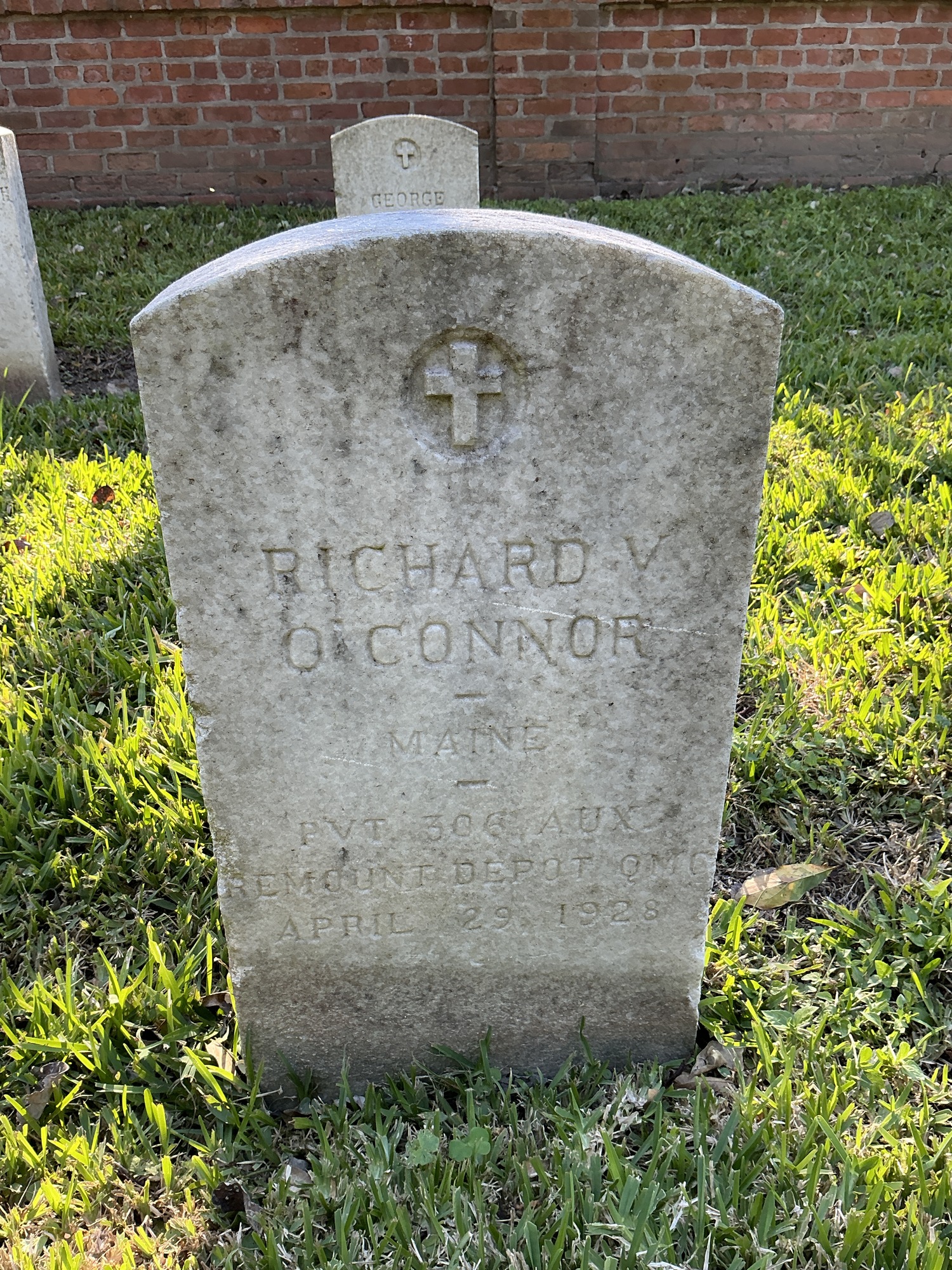 Front of upright marble headstone with flat face.