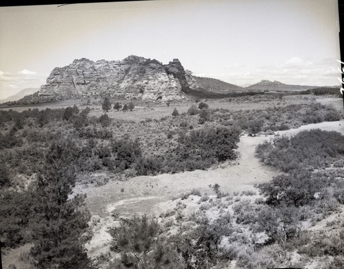 Improper land use- dirt tank for catching flood water.