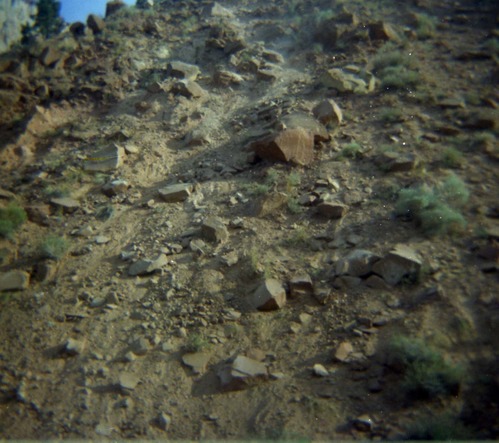 Color Photo of a rock slide near the junction of routes 1 and 2.