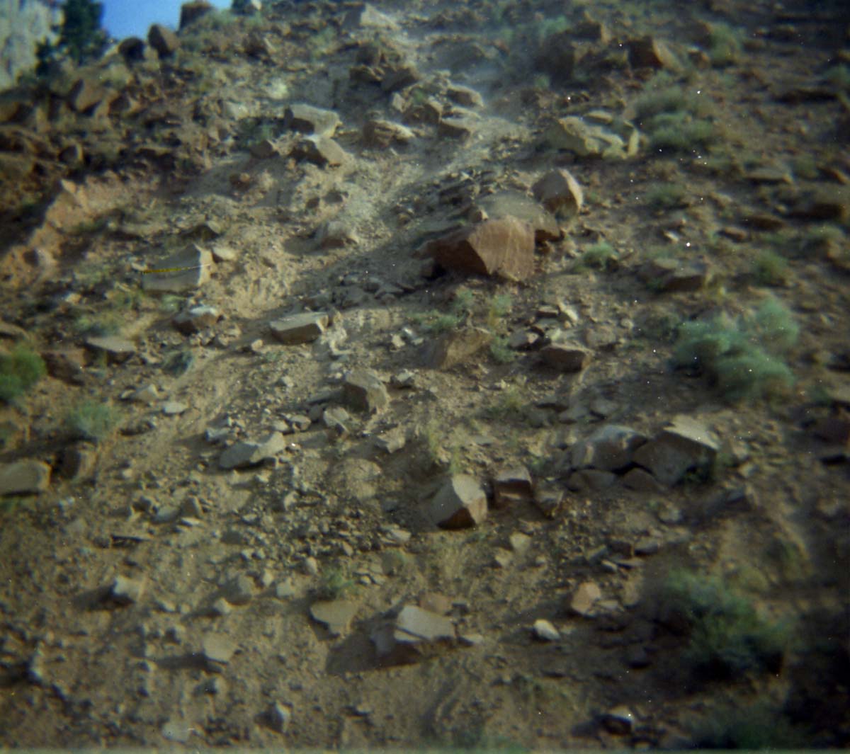 Color Photo of a rock slide near the junction of routes 1 and 2.