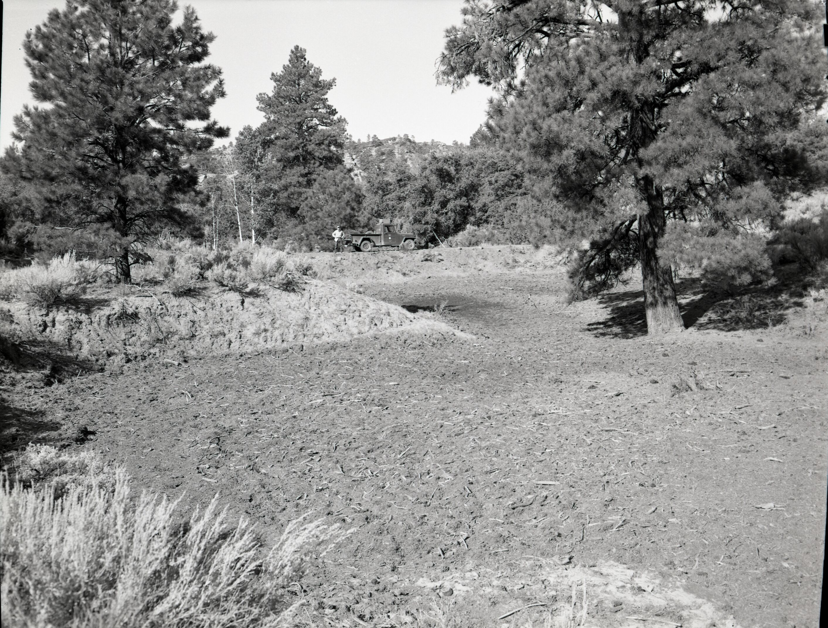 Illegally constructed water reservoir on government property.