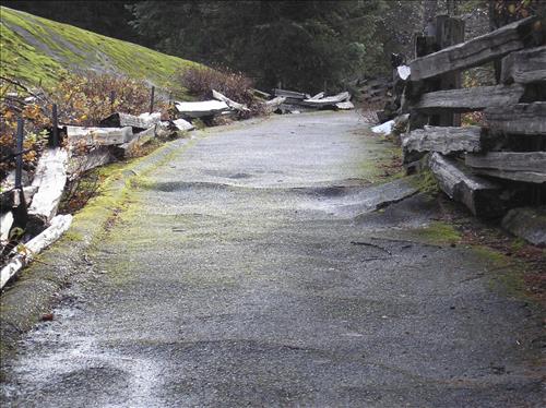 Deteriorated ashpalt at Box Canyon in 2011.