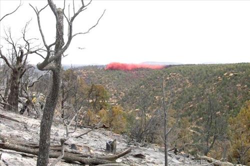Helicopter involved in fire retardant operations, Long Mesa Fire, Mesa Verde National Park, July-August 2002