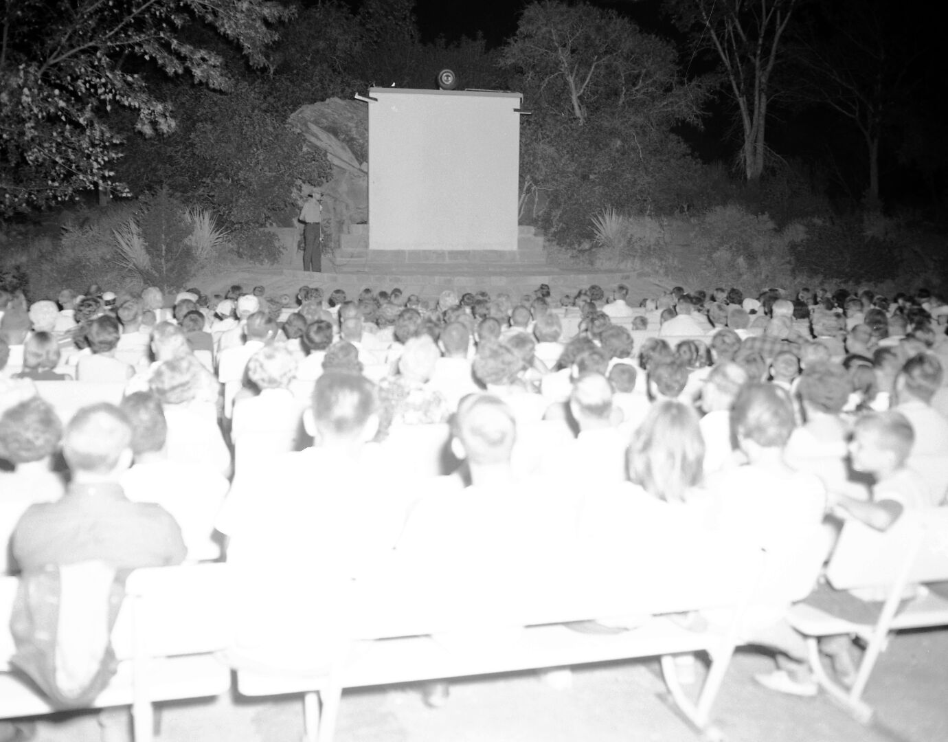 Campers enjoying evening program at South Campground amphitheater.