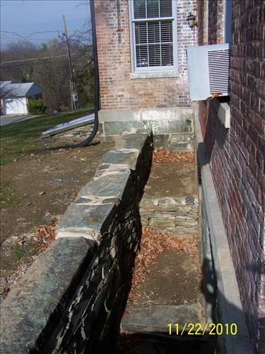 Restoration of the stone foundation walls for the southwest porch of the historic Brackett House, HAFE/NPS, November 22, 2010.
