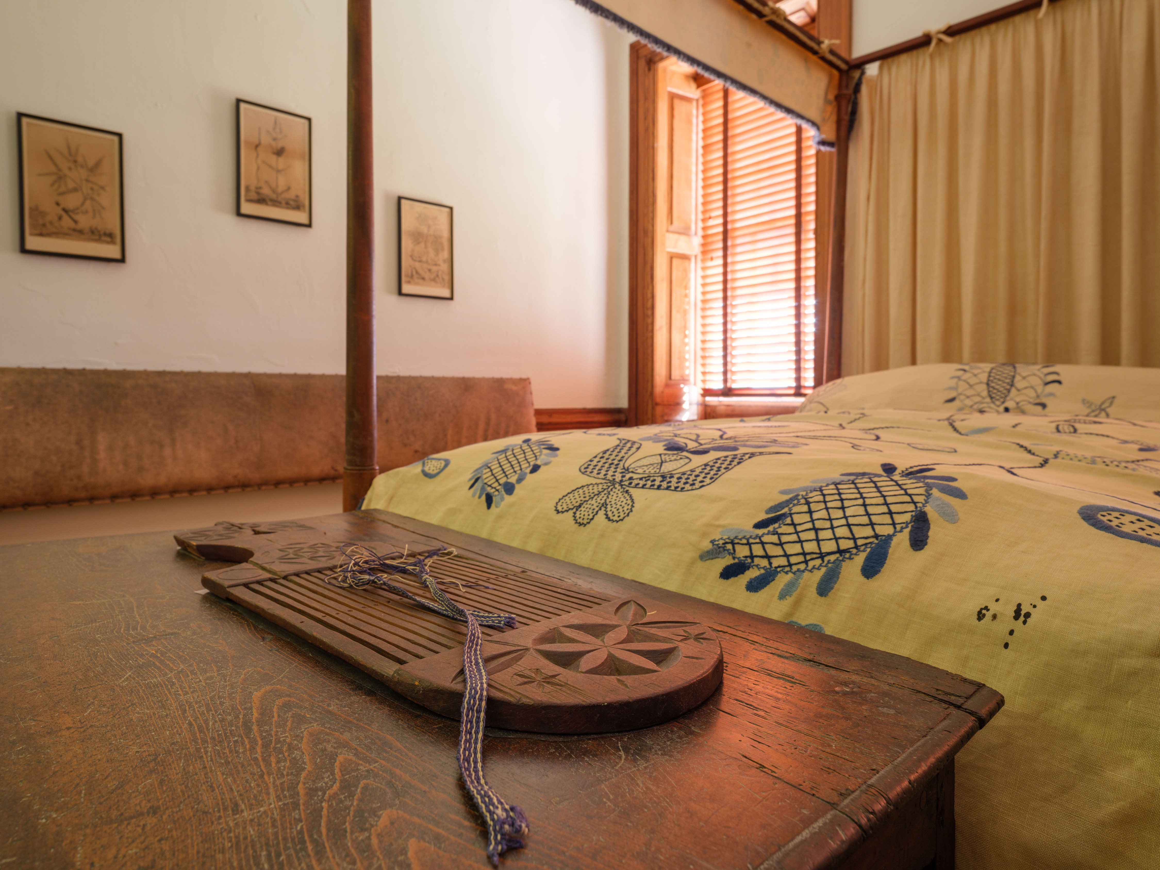 Guest bedroom with bed and dresser